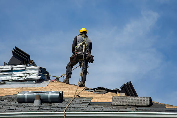 Professional Storm Damage Roof Repair technician working in Gilmanton Iron Works, NH